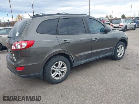 ✅ 2012 Hyundai Santa Fe GLS • VIN: 5XYZG3AB6CG142145 • Лот: 43669690. Опубликован ранее на IAAI с пробегом 229 720 миль. Бесплатный доступ к архиву аукционных продаж из США и подробный отчёт об истории автомобиля на DreamBid. Изображение 4.