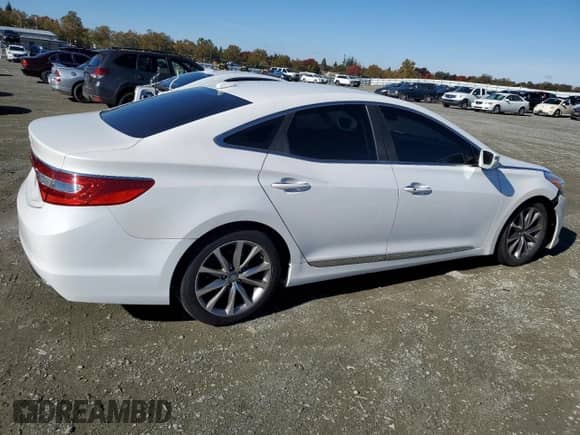 2015 Hyundai Azera z VIN KMHFG4JG1FA472859, wystawiony jako Copart lot #80162484 z przebiegiem 187 344 mil mil oraz Czysty tytuł • Clean title. Historia ofert i sprzedaży dostępna na DreamBid. Obrazek 3.