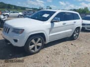 ✅ 2014 Jeep Grand Cherokee Overland • VIN: 1C4RJFCG0EC238873 • Lot: 42436535. Listed on IAAI with 154,384 mi. Free auction sales archive from the USA and detailed vehicle history report at DreamBid. Image 2.
