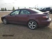 ✅ 2006 Mazda 6 i • VIN: 1YVFP80C165M20242 • Lot: 80761905. Wystawiony na Copart z przebiegiem 238 430 mil. Bezpłatny archiwum sprzedaży aukcyjnych z USA i szczegółowy raport historii pojazdu na DreamBid. Zdjęcie 2.