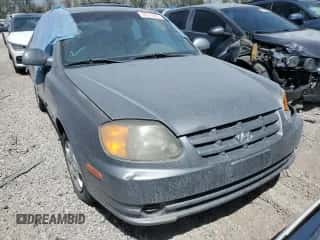 2003 Hyundai Accent GL с VIN KMHCG45C73U471607, выставлен на аукционе Copart как лот 58813445 с пробегом 222 326 миль миль и На запчасти • Non repairable. История ставок и продаж доступна на DreamBid. Изображение 5.