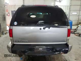 2004 Chevrolet Blazer LS z VIN 1GNDT13X84K112313, wystawiony jako Copart lot #62817553 z przebiegiem 156 427 mil mil oraz Szkoda całkowita • Salvage title. Historia ofert i sprzedaży dostępna na DreamBid. Obrazek 6.