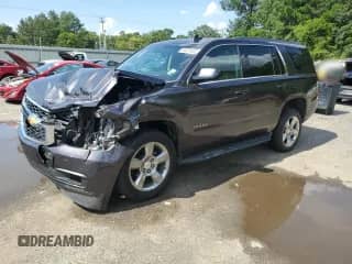 2018 Chevrolet Tahoe LS with VIN 1GNSCAKC2JR339912, listed as a Copart auction lot 69231005 with 132,231 mi miles and Salvage title. Bid and sale history available at DreamBid. Image 1.