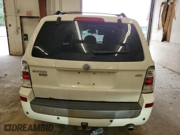 ✅ 2009 Mercury Mariner Premier • VIN: 4M2CU97G49KJ26012 • Lot: 68007975. Listed on Copart with 153,173 mi. Free auction sales archive from the USA and detailed vehicle history report at DreamBid. Image 6.