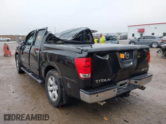 ✅ 2009 Nissan Titan SE • VIN: 1N6BA07D59N318062 • Лот: 41450288. Опубликован ранее на IAAI с пробегом Не указан. Бесплатный доступ к архиву аукционных продаж из США и подробный отчёт об истории автомобиля на DreamBid. Изображение 3.