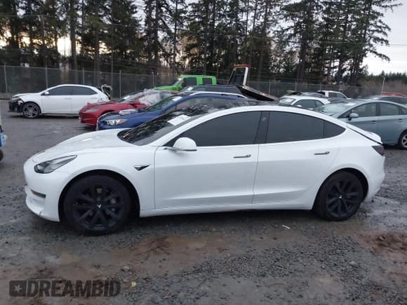 ✅ 2020 Tesla Model 3 Standard Range Plus • VIN: 5YJ3E1EA7LF799447 • Лот: 43752660. Опубликован ранее на IAAI с пробегом 63 864 миль. Бесплатный доступ к архиву аукционных продаж из США и подробный отчёт об истории автомобиля на DreamBid. Изображение 15.
