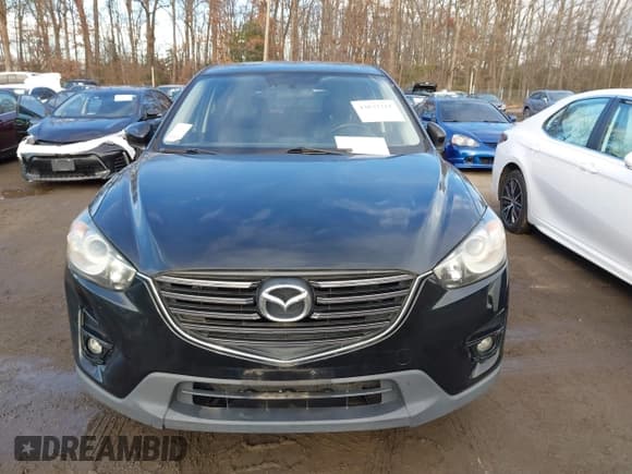 ✅ 2016 Mazda CX-5 Grand Touring • VIN: JM3KE4DY8G0834567 • Lot: 43837311. Wystawiony na IAAI z przebiegiem Nie podano. Bezpłatny archiwum sprzedaży aukcyjnych z USA i szczegółowy raport historii pojazdu na DreamBid. Zdjęcie 11.