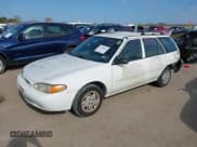 ✅ 1998 Ford Escort SE • VIN: 3FAFP15P1WR237676 • Lot: 41238541. Wystawiony na IAAI z przebiegiem 77 139 mil. Bezpłatny archiwum sprzedaży aukcyjnych z USA i szczegółowy raport historii pojazdu na DreamBid. Zdjęcie 18.