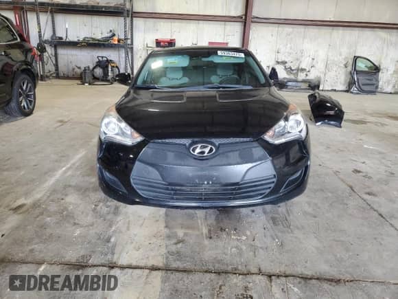 2012 Hyundai Veloster w/Gray Int с VIN KMHTC6ADXCU042208, выставлен на аукционе Copart как лот 59363475 с пробегом 168 841 миль миль и Списание • Salvage title. История ставок и продаж доступна на DreamBid. Изображение 5.