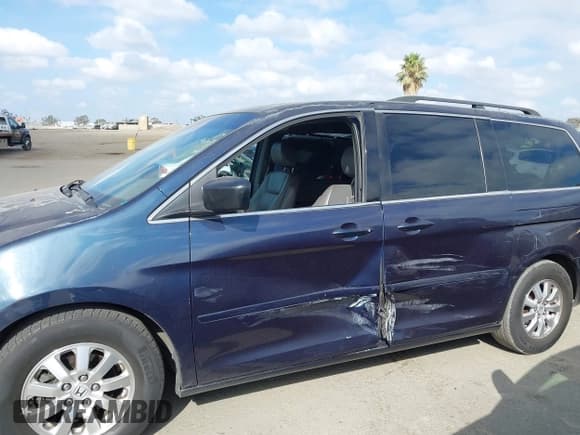 ✅ 2009 Honda Odyssey EX-L • VIN: 5FNRL38699B029505 • Lot: 43326095. Listed on IAAI with 155,185 mi. Free auction sales archive from the USA and detailed vehicle history report at DreamBid. Image 6.
