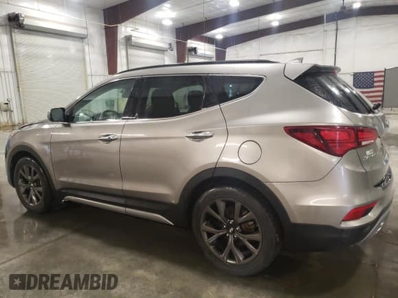 ✅ 2018 Hyundai Santa Fe Ultimate • VIN: 5XYZWDLA4JG554817 • Lot: 59900594. Listed on Copart with 33,137 mi. Free auction sales archive from the USA and detailed vehicle history report at DreamBid. Image 2.