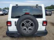 ✅ 2022 Jeep Wrangler Unlimited Sport Altitude • VIN: 1C4HJXDN0NW132386 • Лот: 61382185. Опубликован ранее на Copart с пробегом 65 673 миль. Бесплатный доступ к архиву аукционных продаж из США и подробный отчёт об истории автомобиля на DreamBid. Изображение 6.