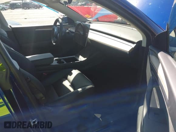 ✅ 2023 Tesla Model Y Long Range • VIN: 7SAYGDEE6PA162351 • Lot: 43515048. Listed on IAAI with 24,605 mi. Free auction sales archive from the USA and detailed vehicle history report at DreamBid. Image 5.