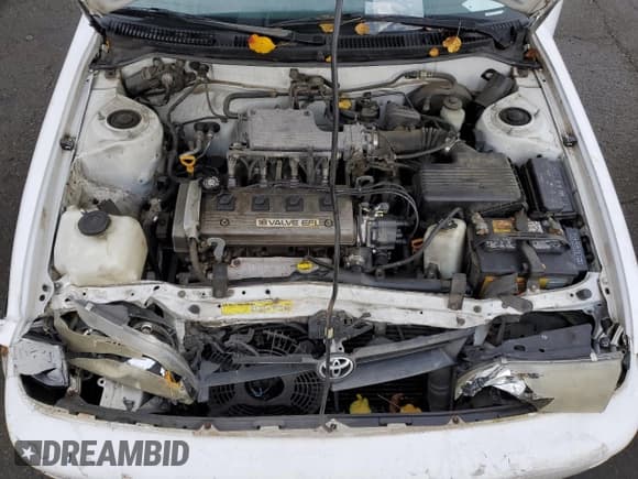 ✅ 1994 Toyota Corolla • VIN: 1NXAE04B2RZ175367 • Lot: 82191804. Wystawiony na Copart z przebiegiem 168 836 mil. Bezpłatny archiwum sprzedaży aukcyjnych z USA i szczegółowy raport historii pojazdu na DreamBid. Zdjęcie 11.