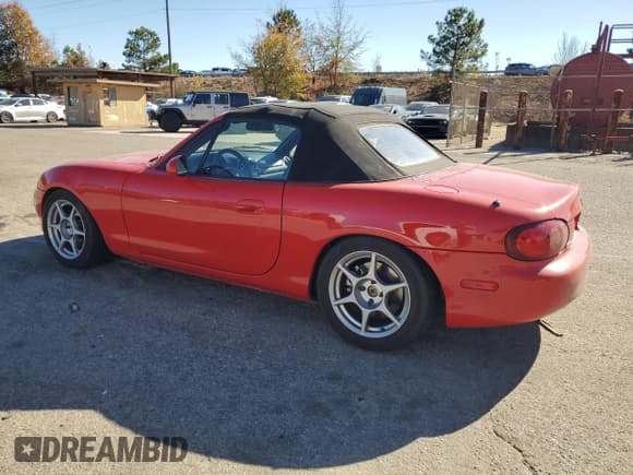 ✅ 2004 Mazda MX-5 Miata LS • VIN: JM1NB353740400440 • Lot: 90716375. Listed on Copart with 181,453 mi. Free auction sales archive from the USA and detailed vehicle history report at DreamBid. Image 2.