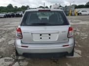 ✅ 2013 Suzuki SX4 Crossover • VIN: JS2YB5A30D6100255 • Лот: 61288755. Опубликован ранее на Copart с пробегом 136 961 миль. Бесплатный доступ к архиву аукционных продаж из США и подробный отчёт об истории автомобиля на DreamBid. Изображение 6.