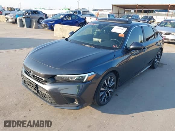 ✅ 2022 Honda Civic EX • VIN: 2HGFE1F73NH311660 • Lot: 43165014. Listed on IAAI with 59,699 mi. Free auction sales archive from the USA and detailed vehicle history report at DreamBid. Image 18.