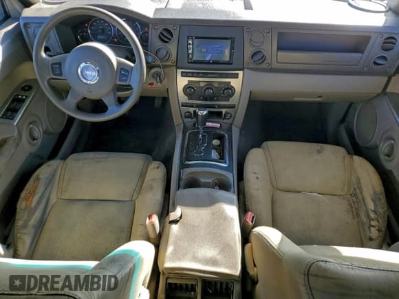 ✅ 2007 Jeep Commander Sport • VIN: 1J8HH48K97C695976 • Лот: 95213785. Опубликован ранее на Copart с пробегом 285 151 миль. Бесплатный доступ к архиву аукционных продаж из США и подробный отчёт об истории автомобиля на DreamBid. Изображение 8.