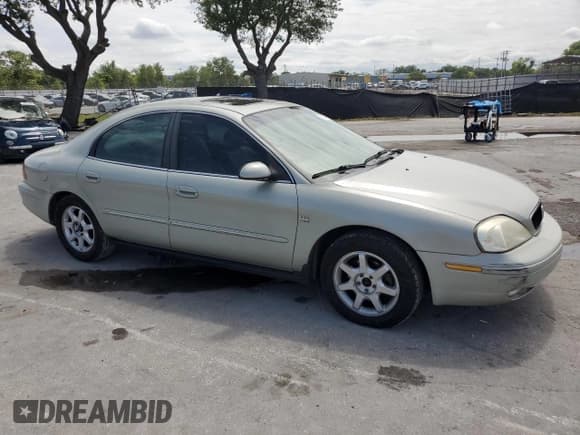 ✅ 2003 Mercury Sable LS Premium • VIN: 1MEFM55S23A617225 • Lot: 52021765. Listed on Copart with 131,291 mi. Free auction sales archive from the USA and detailed vehicle history report at DreamBid. Image 4.