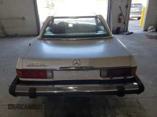 ✅ 1978 Mercedes-Benz SL • VIN: 10704412048772 • Лот: 85919765. Опубликован ранее на Copart с пробегом 45 120 миль. Бесплатный доступ к архиву аукционных продаж из США и подробный отчёт об истории автомобиля на DreamBid. Изображение 6.