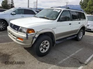 ✅ 1999 Mitsubishi Montero Sport LS • VIN: JA4LS31H2XP037110 • Лот: 45447485. Опубликован ранее на Copart с пробегом 166 942 миль. Бесплатный доступ к архиву аукционных продаж из США и подробный отчёт об истории автомобиля на DreamBid. Изображение 1.