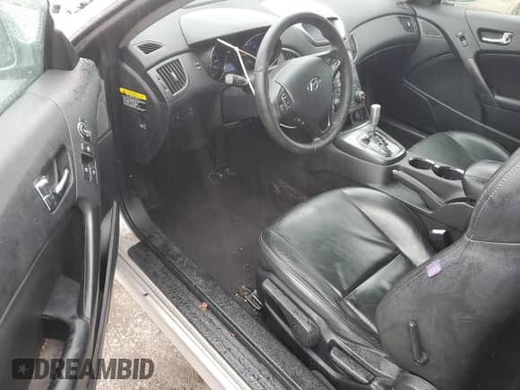 2012 Hyundai Genesis Coupe 2.0T z VIN KMHHT6KD2CU074526, wystawiony jako Copart lot #42262575 z przebiegiem 148 710 mil mil oraz Szkoda całkowita • Salvage title. Historia ofert i sprzedaży dostępna na DreamBid. Obrazek 8.