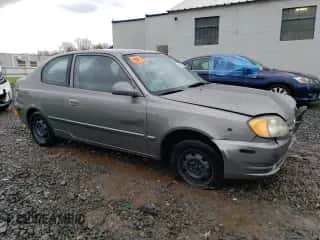 2003 Hyundai Accent GL z VIN KMHCG35C33U261046, wystawiony jako Copart lot #48846125 z przebiegiem 108 742 mil mil oraz Szkoda całkowita • Salvage title. Historia ofert i sprzedaży dostępna na DreamBid. Obrazek 4.