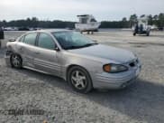 ✅ 2000 Pontiac Grand Am SE1 • VIN: 1G2NF52E7YM865163 • Lot: 48980595. Wystawiony na Copart z przebiegiem 198 303 mil. Bezpłatny archiwum sprzedaży aukcyjnych z USA i szczegółowy raport historii pojazdu na DreamBid. Zdjęcie 4.