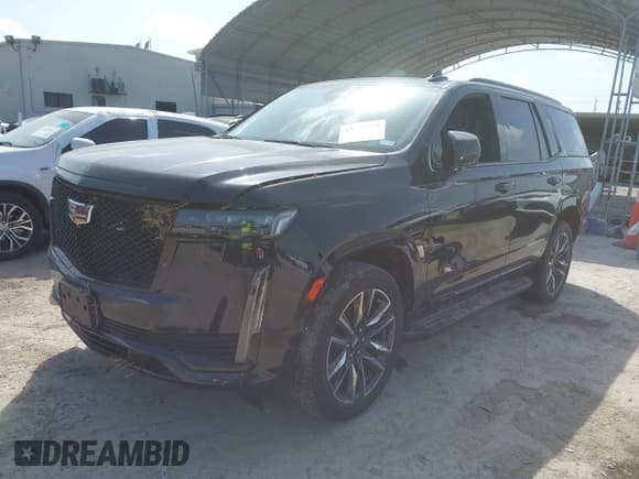 ✅ 2023 Cadillac Escalade 4WD Sport • VIN: 1GYS4EKL7PR184399 • Лот: 42688199. Опубликован ранее на IAAI с пробегом 52 000 миль. Бесплатный доступ к архиву аукционных продаж из США и подробный отчёт об истории автомобиля на DreamBid. Изображение 17.