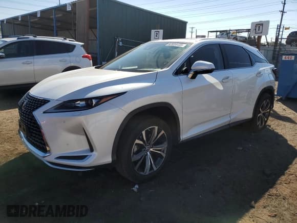 ✅ 2021 Lexus RX 350 • VIN: JTJHZMDA6M2052002 • Lot: 82534435. Listed on Copart with 31,679 mi. Free auction sales archive from the USA and detailed vehicle history report at DreamBid. Image 1.