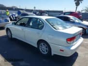 ✅ 2002 Infiniti G20 Luxury • VIN: JNKCP11A22T506533 • Lot: 41671184. Listed on IAAI with 145,168 mi. Free auction sales archive from the USA and detailed vehicle history report at DreamBid. Image 3.