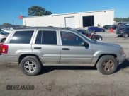 ✅ 2000 Jeep Grand Cherokee Laredo • VIN: 1J4G248S2YC134213 • Lot: 43456750. Listed on IAAI with 242,776 mi. Free auction sales archive from the USA and detailed vehicle history report at DreamBid. Image 12.