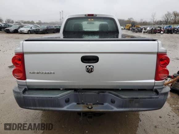 2006 Dodge Dakota ST z VIN 1D7HE22K96S532249, wystawiony jako Copart lot #81780264 z przebiegiem 98 869 mil mil oraz Szkoda całkowita • Salvage title. Historia ofert i sprzedaży dostępna na DreamBid. Obrazek 6.