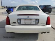 ✅ 2002 Cadillac DeVille • VIN: 1G6KD54Y82U162726 • Lot: 64607424. Listed on Copart with 76,837 mi. Free auction sales archive from the USA and detailed vehicle history report at DreamBid. Image 6.