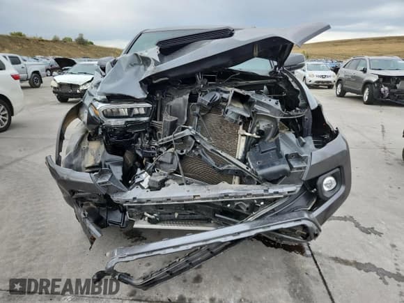 ✅ 2023 Toyota Tacoma TRD Sport • VIN: 3TMCZ5AN1PM557548 • Лот: 82419795. Опубликован ранее на Copart с пробегом 58 725 миль. Бесплатный доступ к архиву аукционных продаж из США и подробный отчёт об истории автомобиля на DreamBid. Изображение 5.