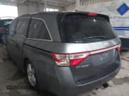 ✅ 2012 Honda Odyssey Touring • VIN: 5FNRL5H92CB106325 • Lot: 43287538. Listed on IAAI with 206,962 mi. Free auction sales archive from the USA and detailed vehicle history report at DreamBid. Image 3.