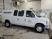 ✅ 2010 Ford Econoline Cargo Commercial • VIN: 1FTNE2EL6ADA07809 • Lot: 60211395. Listed on Copart with 258,970 mi. Free auction sales archive from the USA and detailed vehicle history report at DreamBid. Image 4.