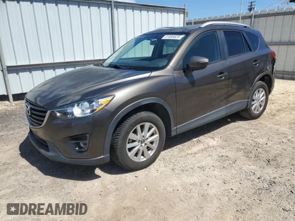 ✅ 2016 Mazda CX-5 Touring • VIN: JM3KE2CY9G0911484 • Lot: 81885825. Listed on Copart with 39,261 mi. Free auction sales archive from the USA and detailed vehicle history report at DreamBid. Image 1.