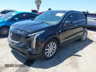 ✅ 2019 Cadillac XT4 FWD Luxury • VIN: 1GYAZAR46KF146371 • Lot: 42655522. Listed on IAAI with 90,633 mi. Free auction sales archive from the USA and detailed vehicle history report at DreamBid. Image 2.