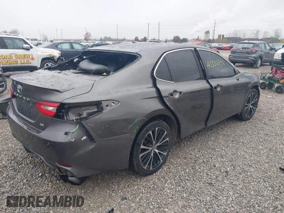✅ 2019 Toyota Camry LE • VIN: 4T1B11HK2KU205294 • Лот: 43652792. Опубликован ранее на IAAI с пробегом 99 493 миль. Бесплатный доступ к архиву аукционных продаж из США и подробный отчёт об истории автомобиля на DreamBid. Изображение 4.