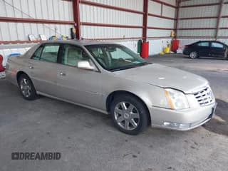 ✅ 2007 Cadillac DTS Luxury II • VIN: 1G6KD57Y17U225670 • Lot: 43211973. Listed on IAAI with 55,587 mi. Free auction sales archive from the USA and detailed vehicle history report at DreamBid. Image 1.