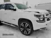 2020 Chevrolet Tahoe Premier with VIN 1GNSKCKJXLR182971, listed as a Copart auction lot 87268634 with 210,000 mi miles and Salvage title. Bid and sale history available at DreamBid. Image 16.