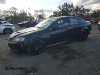 ✅ 2009 Pontiac G8 GT • VIN: 6G2EC57YX9L193038 • Лот: 82635675. Опубликован ранее на Copart с пробегом 156 050 миль. Бесплатный доступ к архиву аукционных продаж из США и подробный отчёт об истории автомобиля на DreamBid. Изображение 1.