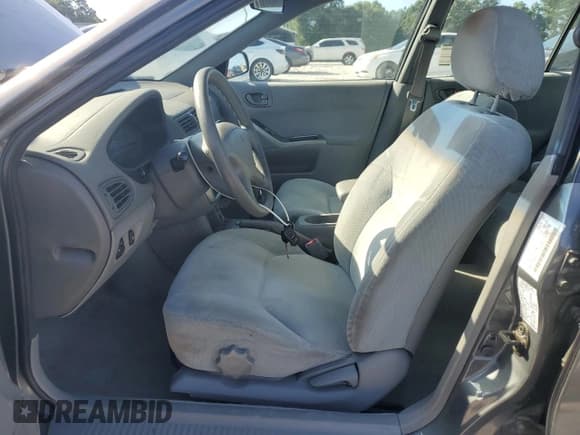 ✅ 2003 Mitsubishi Galant ES • VIN: 4A3AA46G03E042881 • Lot: 61861195. Wystawiony na Copart z przebiegiem 139 049 mil. Bezpłatny archiwum sprzedaży aukcyjnych z USA i szczegółowy raport historii pojazdu na DreamBid. Zdjęcie 7.