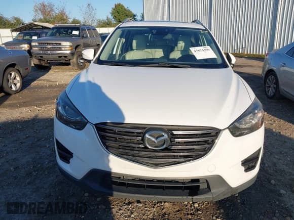 ✅ 2016 Mazda CX-5 Grand Touring • VIN: JM3KE2DYXG0796487 • Lot: 43624306. Wystawiony na IAAI z przebiegiem 233 746 mil. Bezpłatny archiwum sprzedaży aukcyjnych z USA i szczegółowy raport historii pojazdu na DreamBid. Zdjęcie 6.