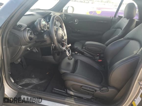 ✅ 2019 MINI Convertible Cooper S • VIN: WMWWG9C50K3J31171 • Lot: 77201264. Listed on Copart with 18,063 mi. Free auction sales archive from the USA and detailed vehicle history report at DreamBid. Image 7.