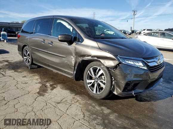 ✅ 2018 Honda Odyssey Elite • VIN: 5FNRL6H98JB097214 • Lot: 87065895. Listed on Copart with 115,569 mi. Free auction sales archive from the USA and detailed vehicle history report at DreamBid. Image 4.