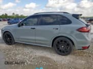 ✅ 2014 Porsche Cayenne GTS • VIN: WP1AD2A2XELA77287 • Lot: 69069815. Listed on Copart with 125,138 mi. Free auction sales archive from the USA and detailed vehicle history report at DreamBid. Image 2.