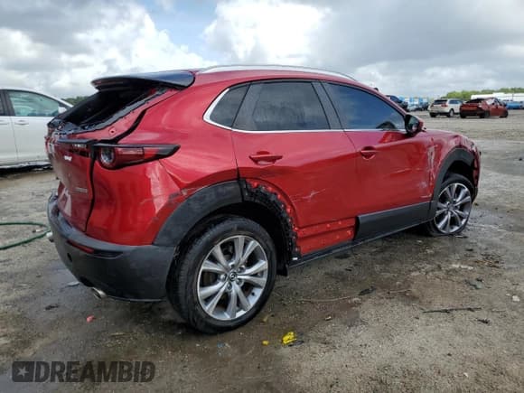 ✅ 2023 Mazda CX-30 S Carbon Edition • VIN: 3MVDMBCM5PM525674 • Лот: 85673565. Опубликован ранее на Copart с пробегом 12 888 миль. Бесплатный доступ к архиву аукционных продаж из США и подробный отчёт об истории автомобиля на DreamBid. Изображение 3.