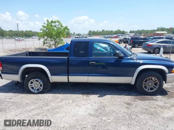2003 Dodge Dakota SLT with VIN 1D7HL42N83S256346, listed as a IAAI auction lot 42454110 with 75,961 mi miles and . Bid and sale history available at DreamBid. Image 13.